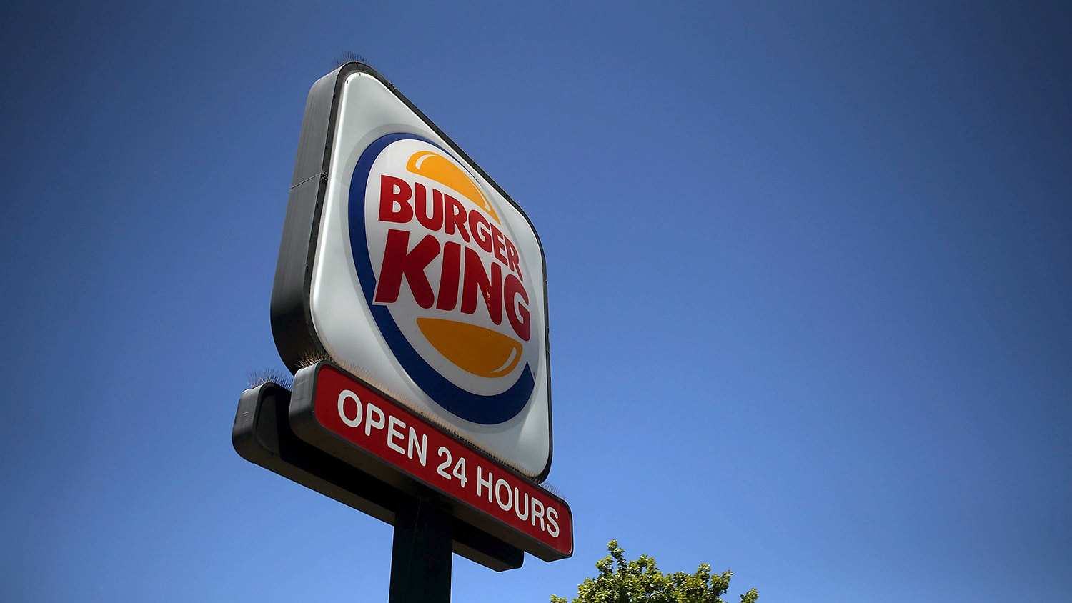 A sign is posted in front of a Burger King restaurant on July 27, 2015 in San Rafael, California

