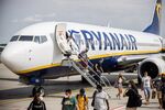 Passengers disembark a Ryanair Holdings Plc aircraft at Budapest Ferenc Liszt International Airport in Budapest.&nbsp;