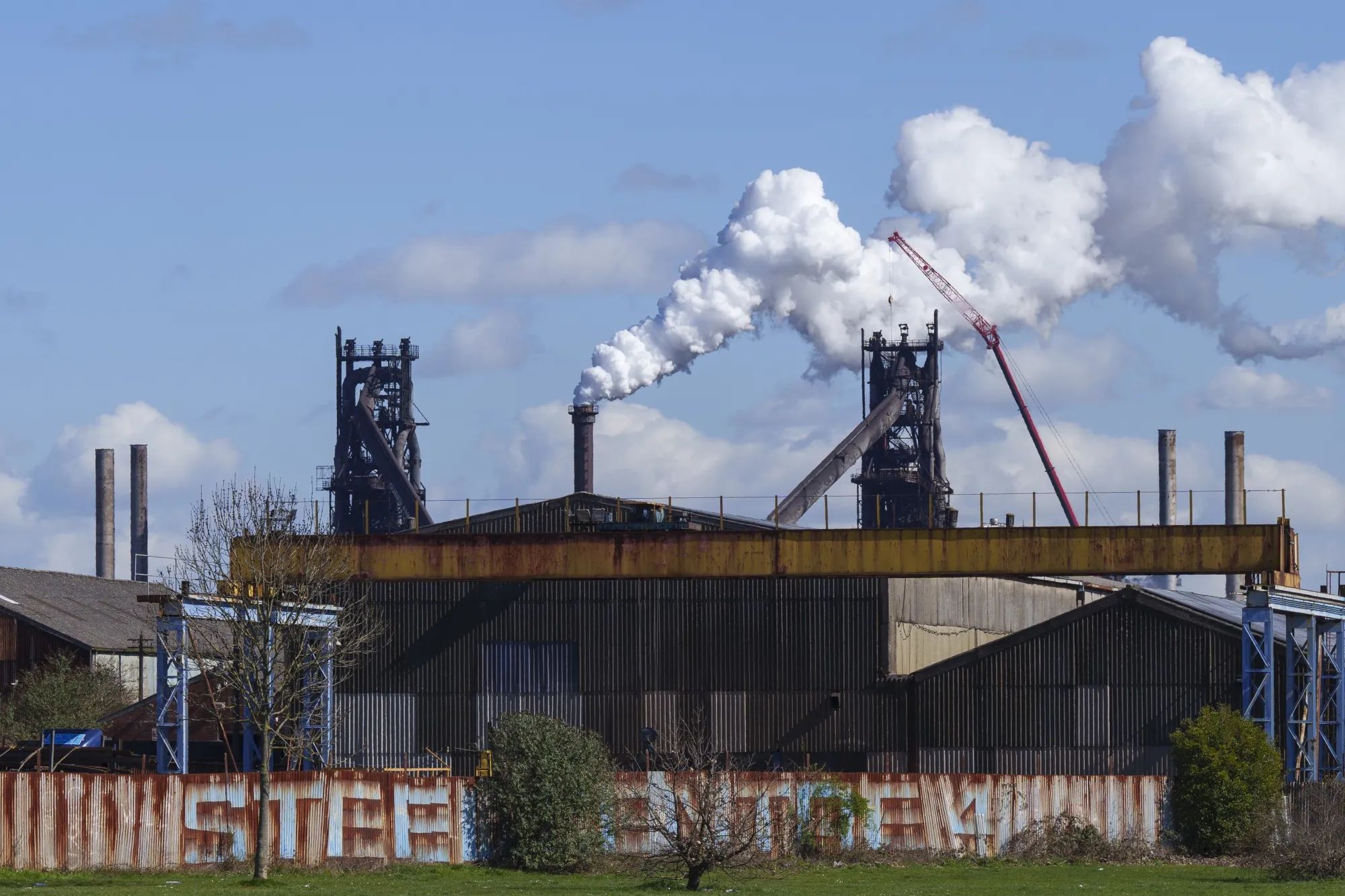 Emissions from chimneys at the British Steel Ltd. plant in Scunthorpe, UK.