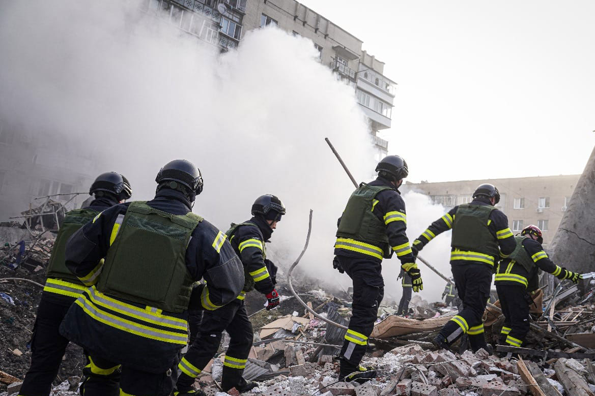 First responders attend the scene of a Russian attack in Khmelnytskyi, Ukraine, on March 22.