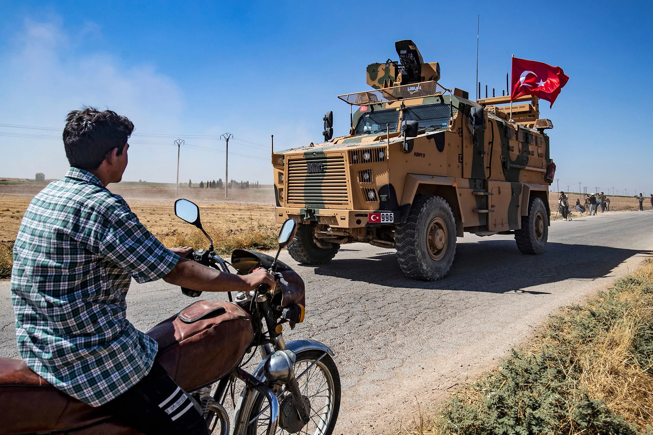 A Turkish military patrols the Syrian village of al-Hashisha on the outskirts of Tal Abyad town along the border with Turkey, on Sept.&nbsp;24, 2019.