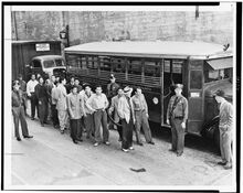 Zoot suiters outside a Los Angeles jail, en route to court after a feud with sailors, in June 1943.