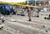 A soldier inspects the scene of a bomb blast in Maiduguri, Nigeria, on March 17