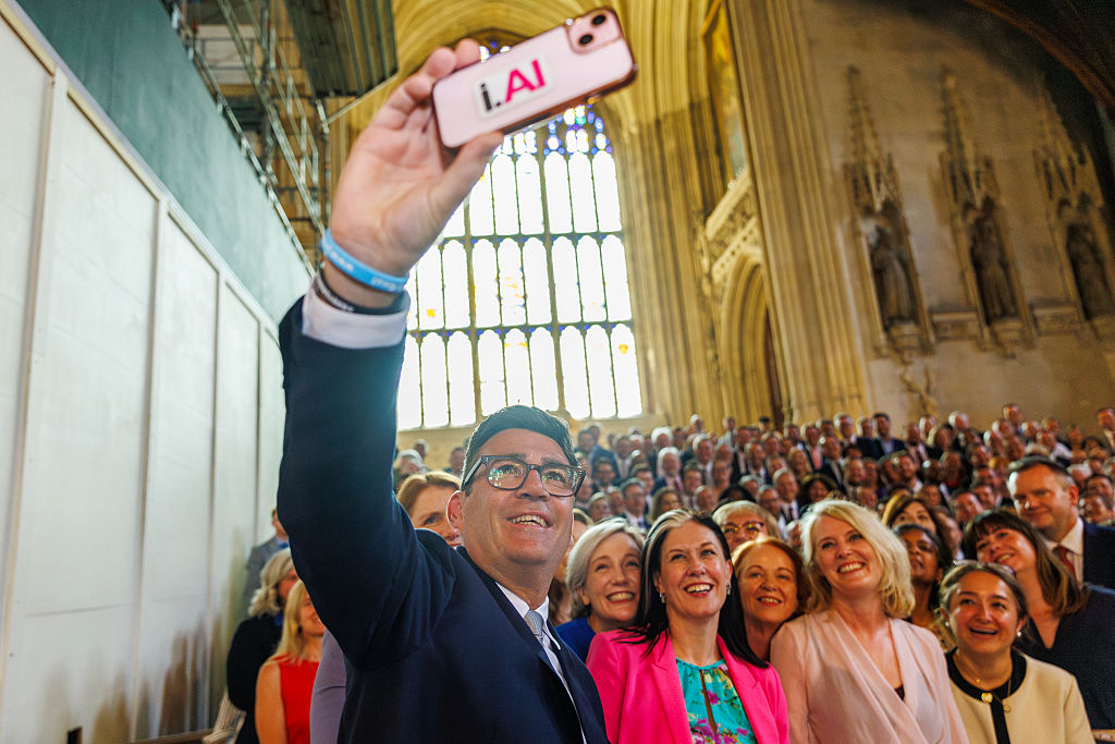 LONDON, ENGLAND - JUNE 22: Andy Burnham, Labour MP for Makerfield, takes a "Selfie" with the Parliamentary Labour Party after his swearing-in at the Houses of Parliament on June 22, 2026 in London, England. Last week Andy Burnham won 54% of the vote in the Makerfield by-election, paving his way to return to Westminster as an MP and challenger to Prime Minister Keir Starmer's leadership. (Photo by Dan Kitwood/Getty Images) Photographer: Dan Kitwood/Getty Images Europe
