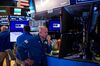 Traders work on the floor of the New York Stock Exchange (NYSE) in New York, U.S., on Friday, June 14, 2019. PetSmart Inc.-controlled Chewy Inc. surged in its first day of trading after raising $1.02 billion in an initial public offering, as investors bet that pet owners will do more of their shopping online for everything from cat food to doggy sweaters.