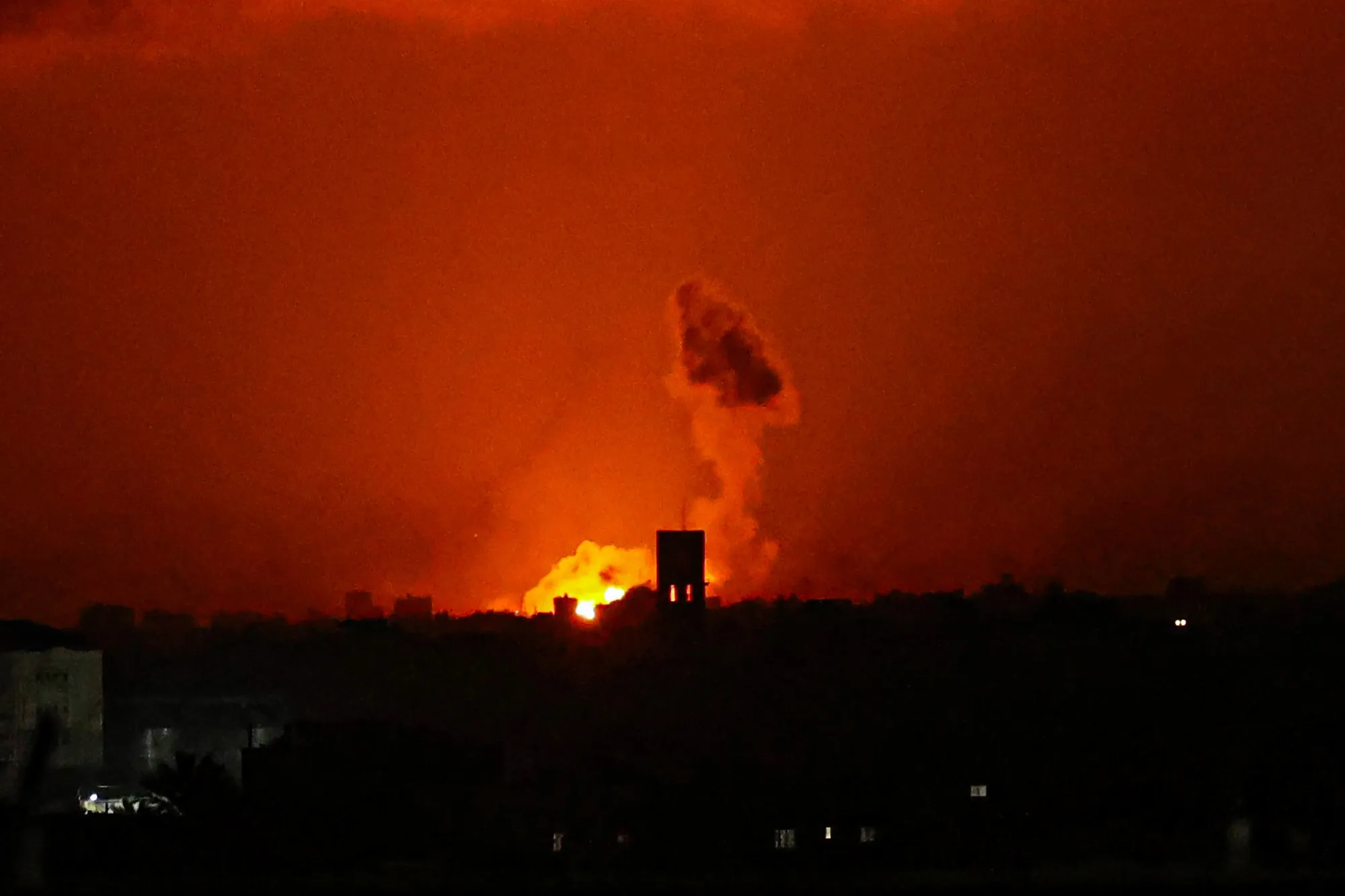 Smoke and flames rise in Rafah in the southern Gaza Strip during Israeli bombardment on January 29, 2024.