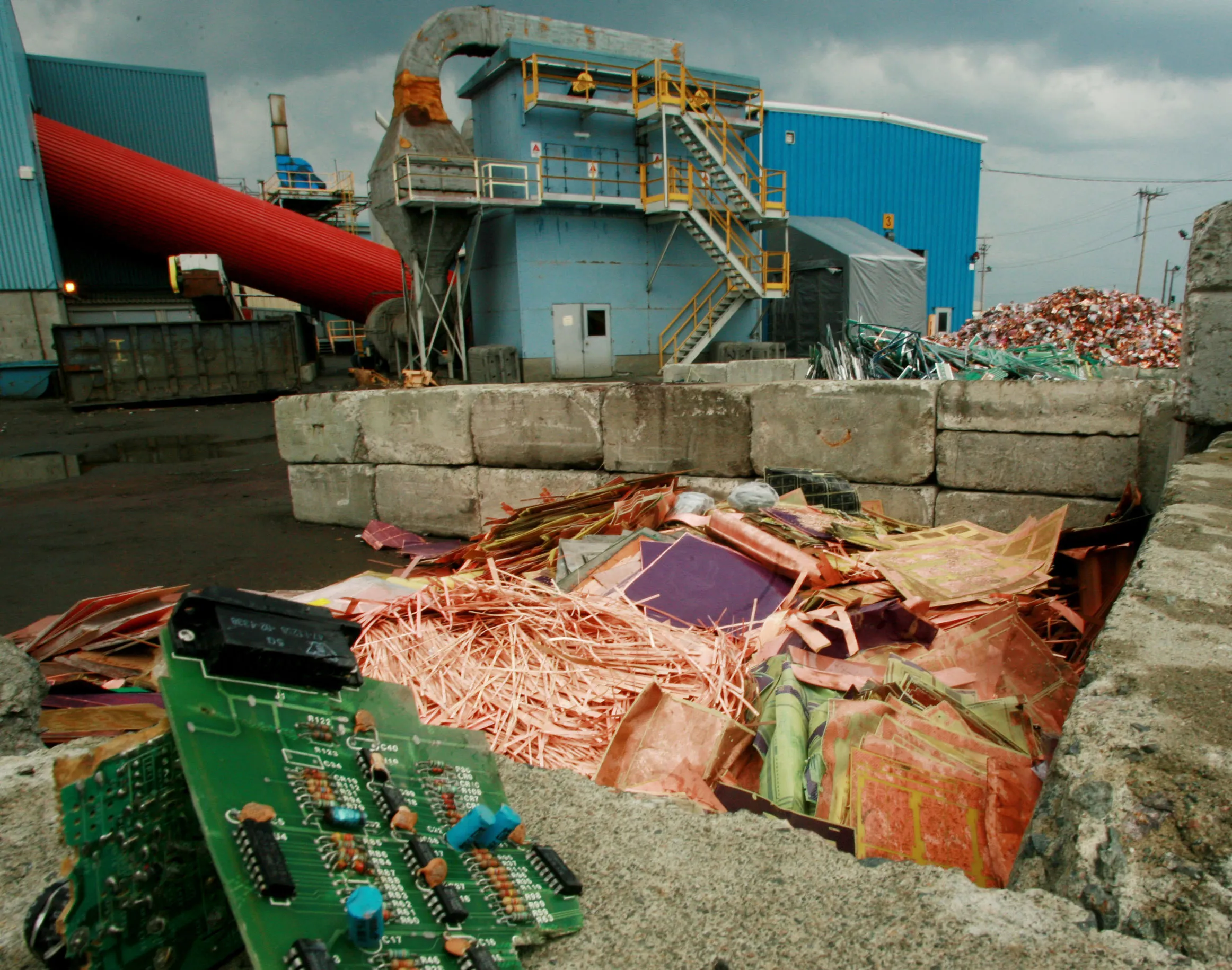 Bits of scrap metal await processing at the Horne copper smelter in Rouyn-Noranda, Quebec, Canada in 2006.