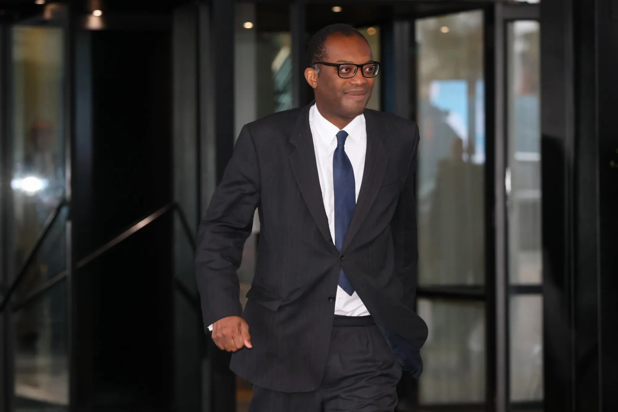 Kwasi Kwarteng departs his hotel in Birmingham on Oct. 4.