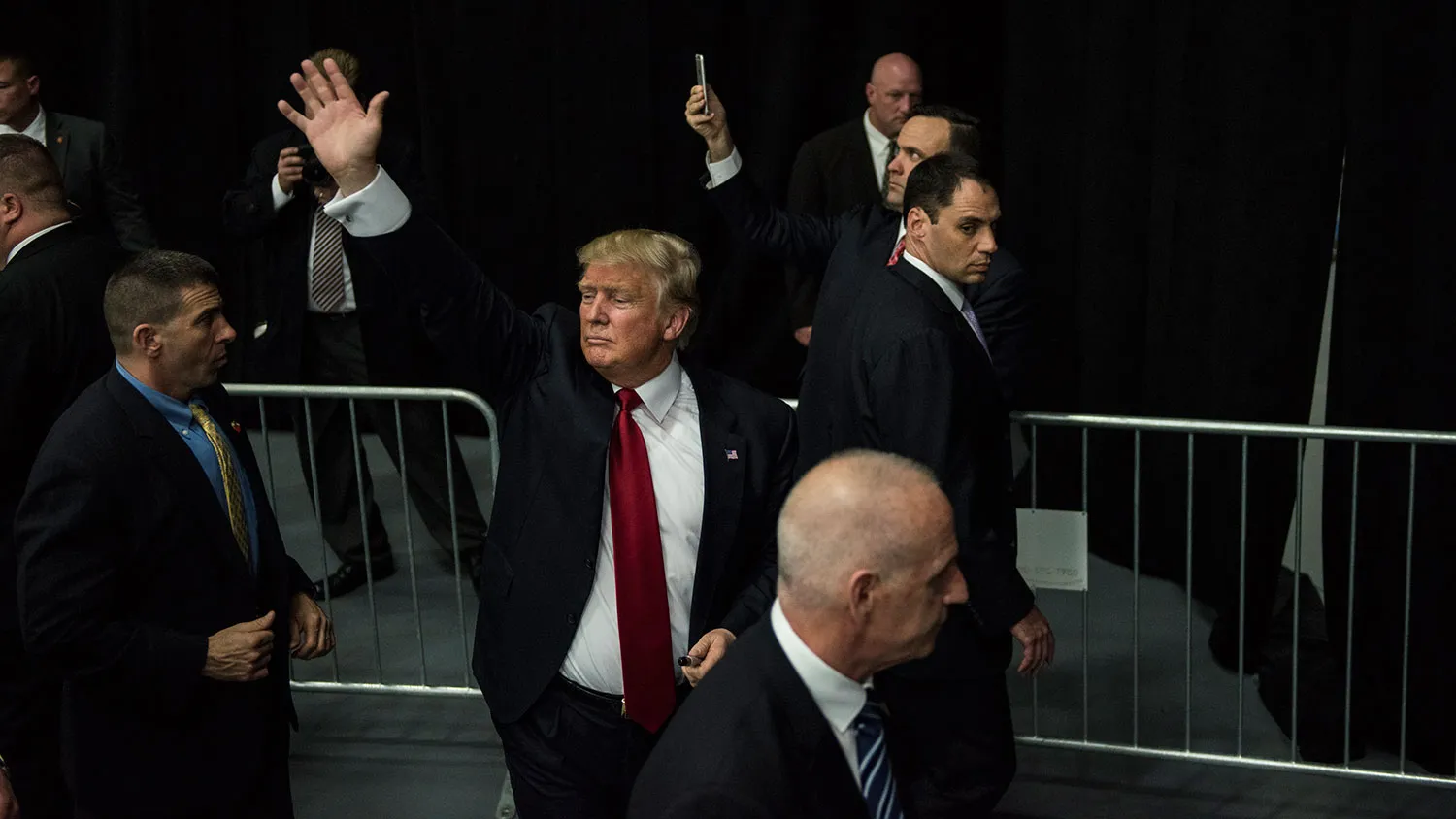 Republican presidential candidate Donald Trump waves to supporters on April 6, 2016, in Bethpage, New York.
