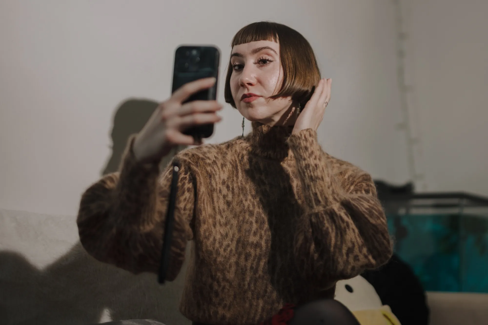 Olivia Meyer, 24, a buyer at a New York department store, posing for a selfie at her apartment in Queens, New York,&nbsp;on Friday, Feb. 6.