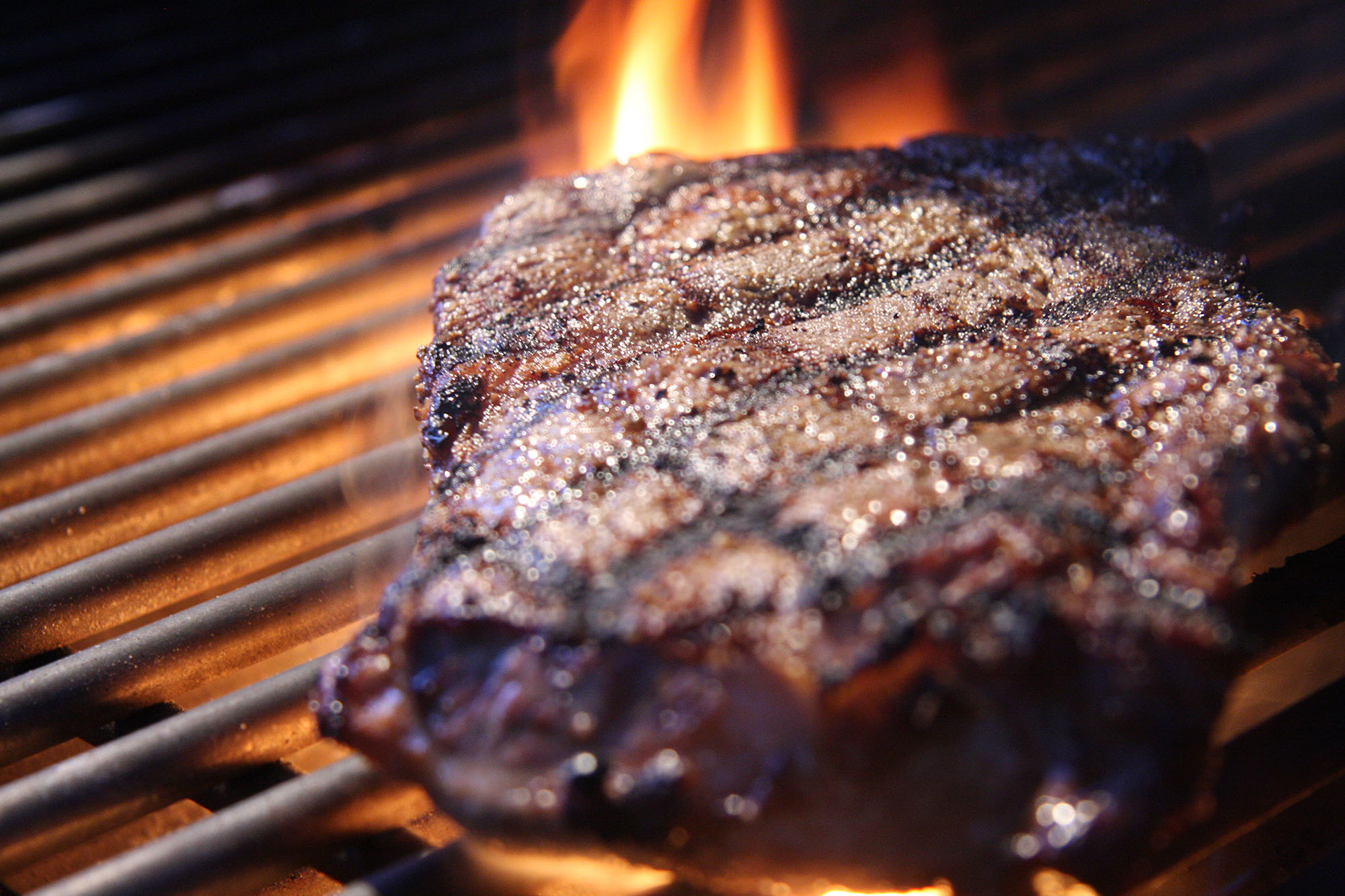 Raising the steaks! World's first AI-powered grill promises to