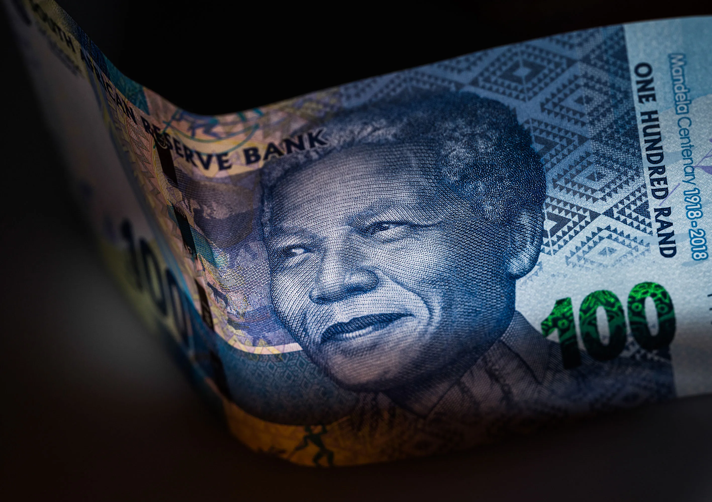 A 100 South African Rand banknote stands in this arranged photograph in London, U.K.