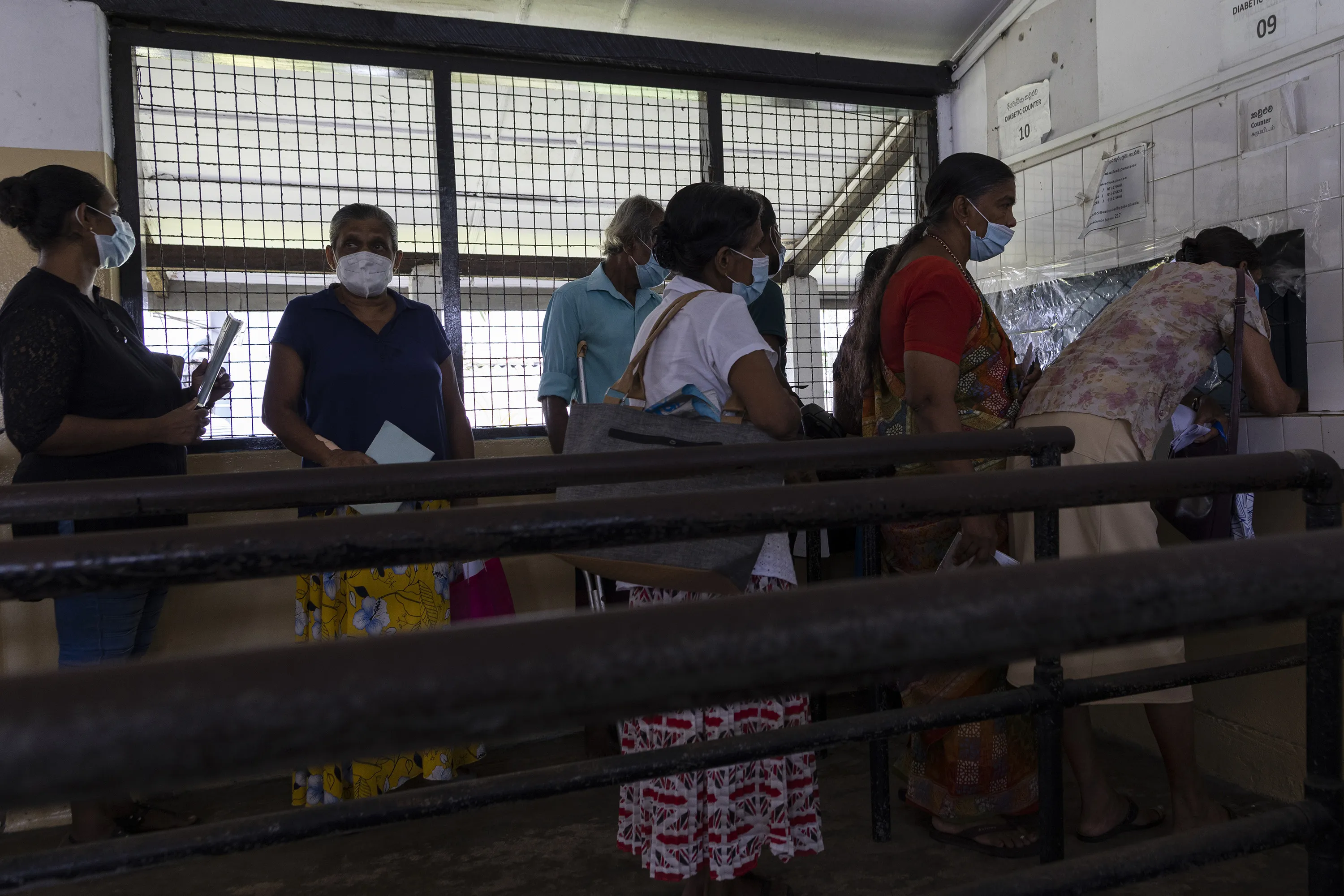 Patients wait to receive drugs in a medicines issue counter at Colombo South Teaching Hospital on May 2.