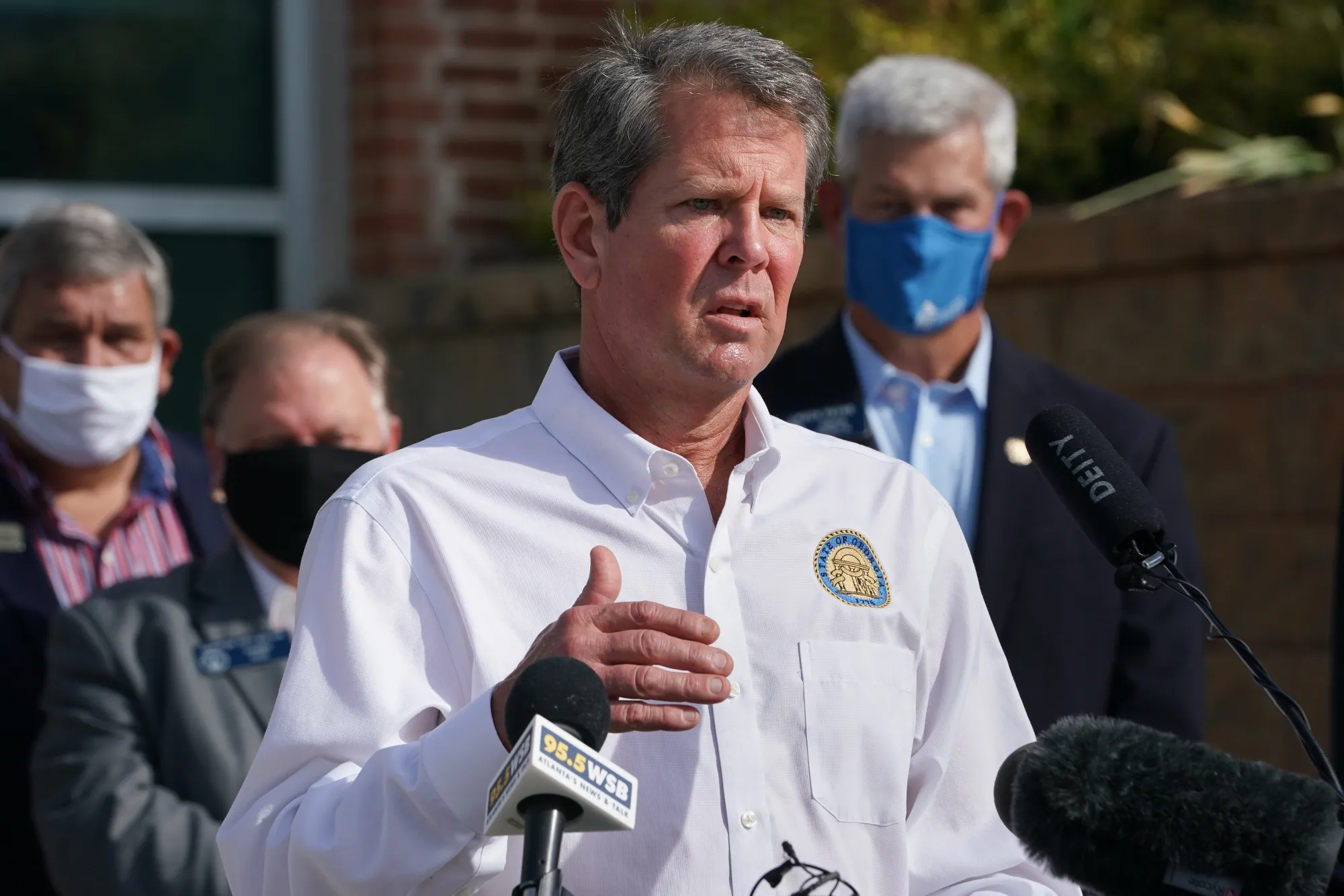 Brian Kemp speaks during a ‘Wear A Mask’ tour stop in Dalton, Georgia on July 2.