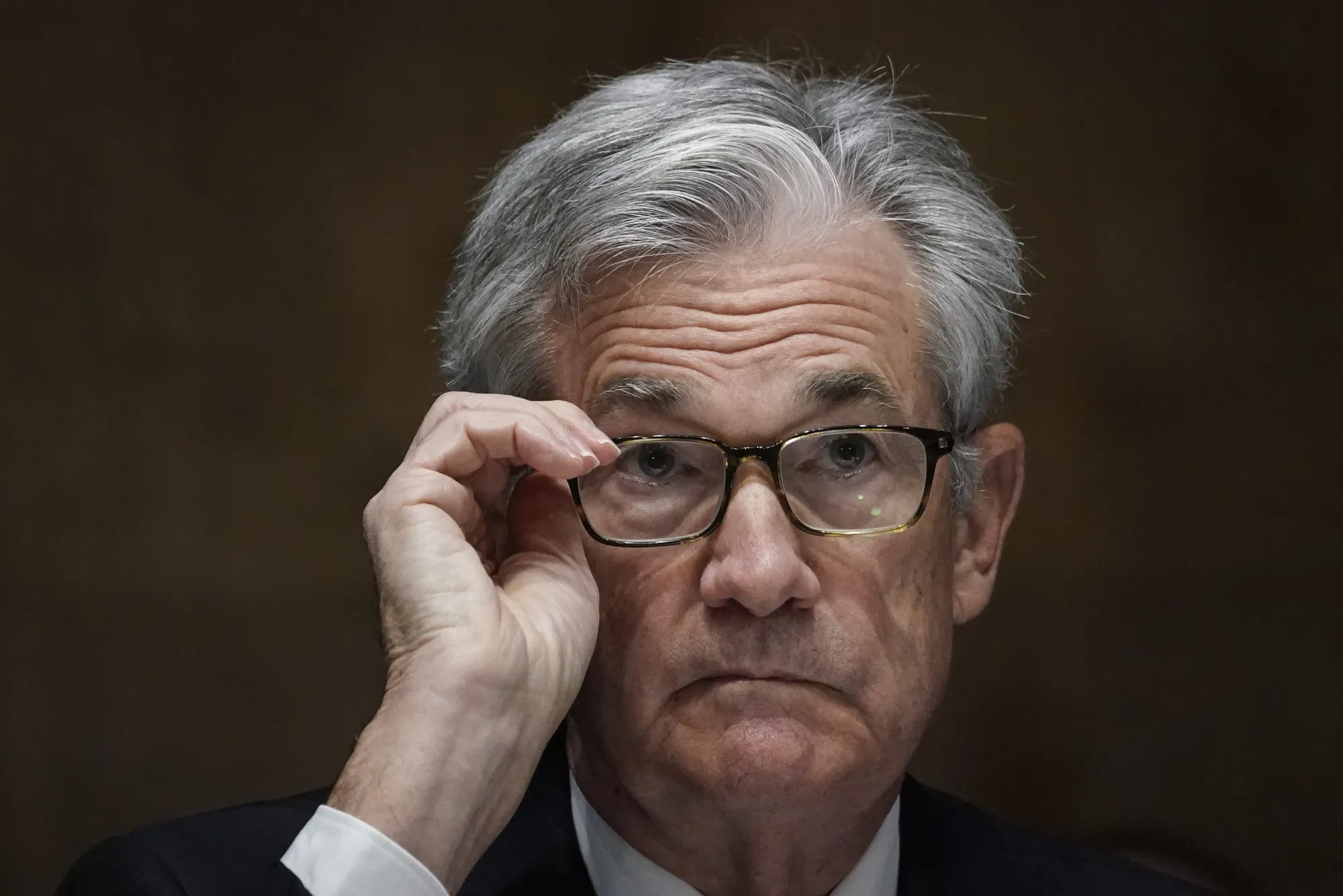Jerome Powell adjusts his glasses during a Senate&nbsp;hearing in Washington, D.C.,&nbsp;on&nbsp;Sept 24.&nbsp;