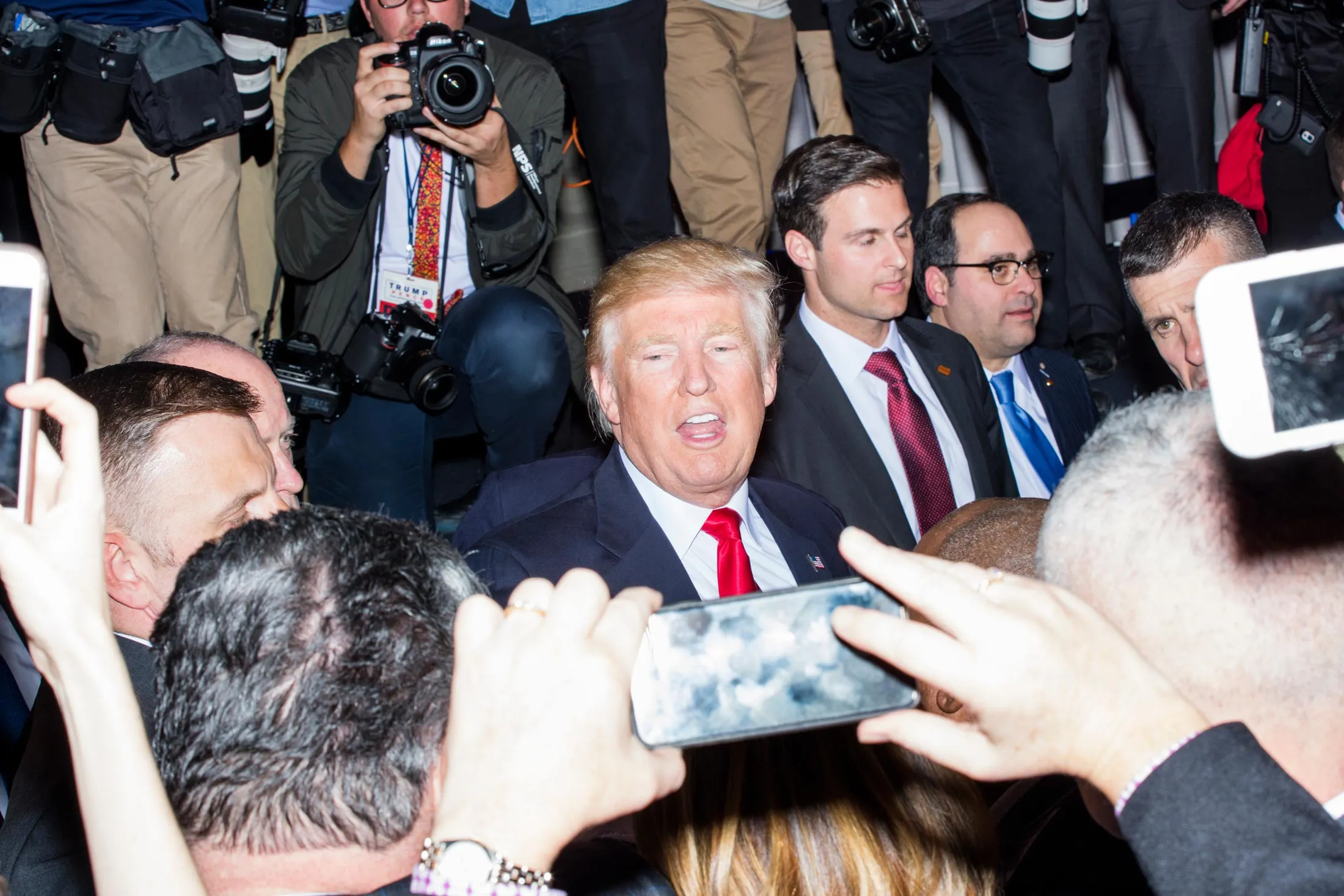 Trump greets the crowd after speaking at his victory party.
