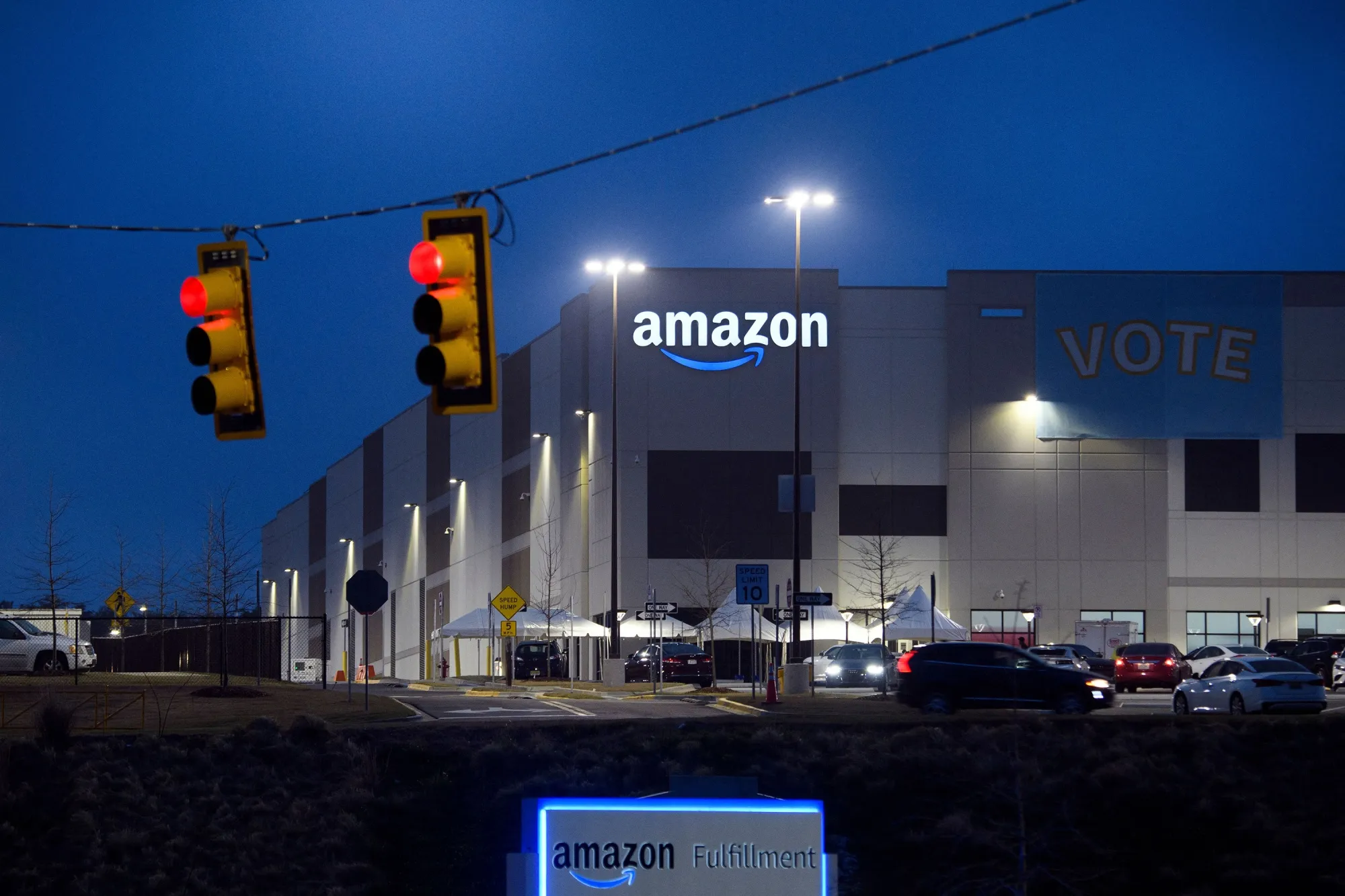 A “Vote” banner hangs at an Amazon fulfillment center in Bessemer, Alabama, on&nbsp;March 27.