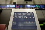 A Goldman Sachs Group Inc. logo hangs on the floor of the New York Stock Exchange.