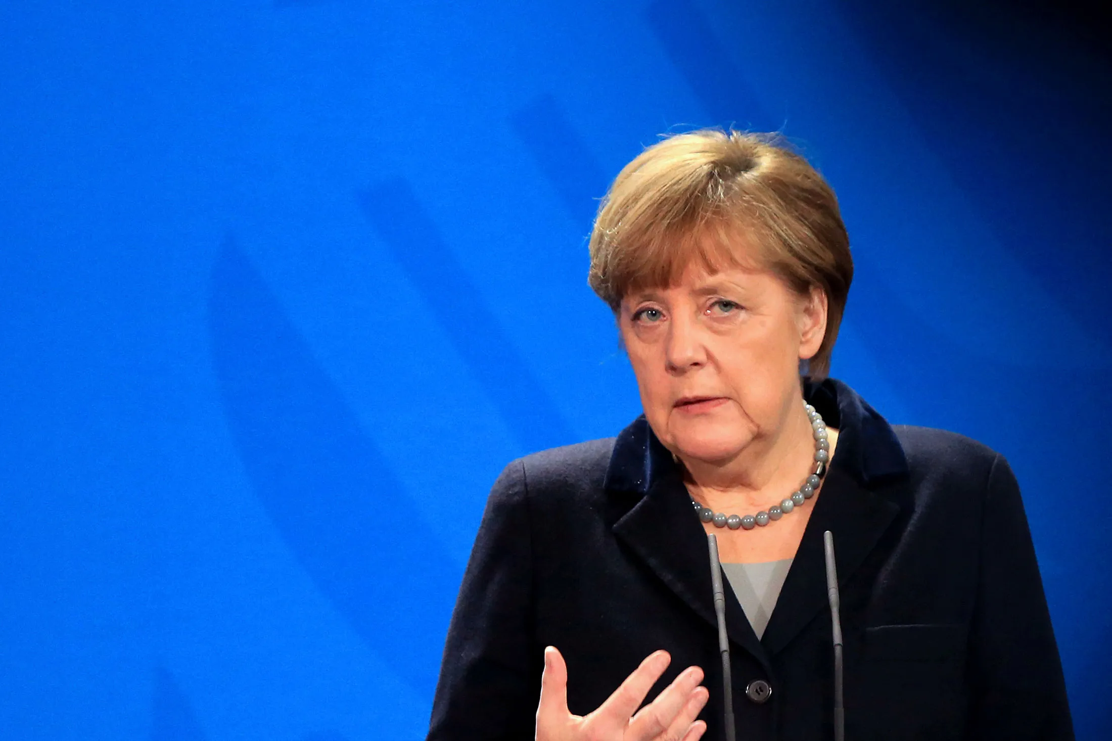 Angela Merkel, Germany's chancellor, speaks during a news conference at the Chancellery in Berlin, Germany, on Monday, Feb. 1, 2016. Merkel won time to reach a Europewide solution to the region's refugee crisis after securing a deal to defuse a spat with her coalition partners that threatened her chancellorship.
