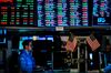 Traders and financial professionals work ahead of the closing bell on the floor of the New York Stock Exchange (NYSE) on January 29, 2019 in New York City. - Shares of large tech companies tumbled Tuesday ahead of big earnings announcements from the sector as US stocks finished a choppy session mostly lower. The tech-rich Nasdaq Composite Index finished 0.8 percent lower at 7,028.29. The Dow Jones Industrial climbed 0.2 percent to 24,579.96, while the broad-based S&P 500 shed 0.2 percent to 2,640.00. (Photo by Johannes EISELE / AFP) (Photo credit should read JOHANNES EISELE/AFP/Getty Images)
