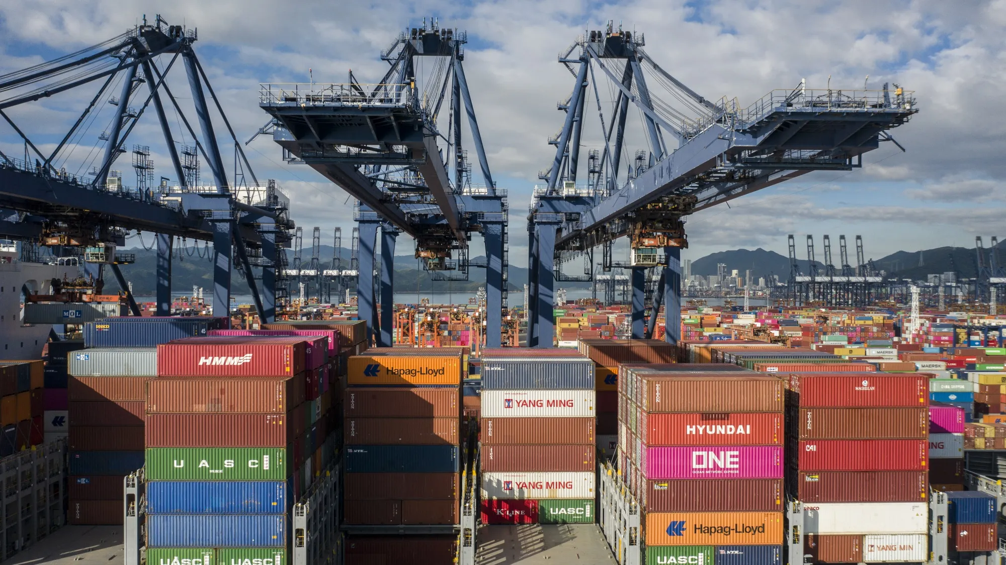 A container ship sits anchored at a terminal in Shenzhen, China.