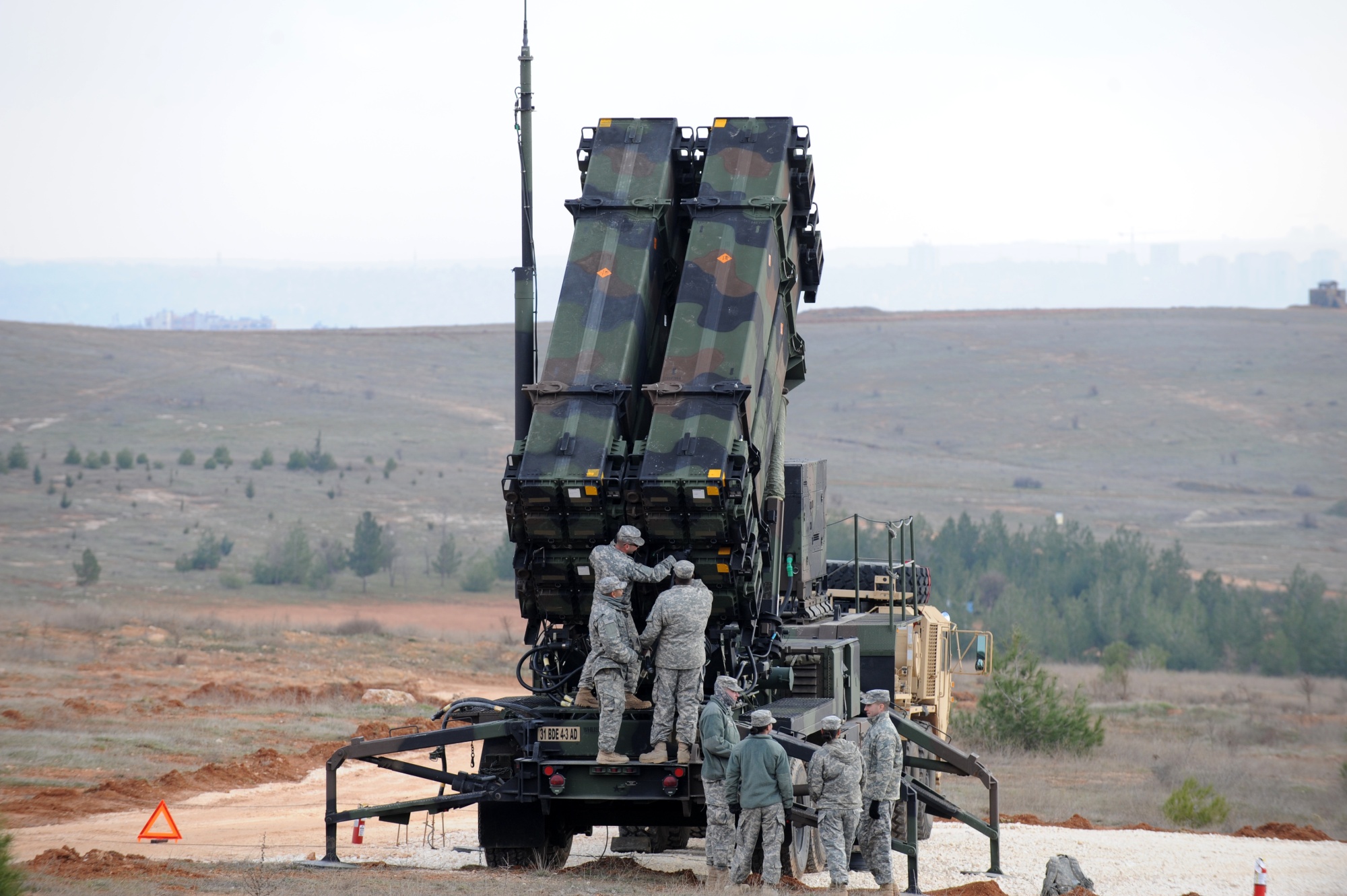 US soldiers work on a Patriot missile system at a military base in Gaziantep, Turkey.