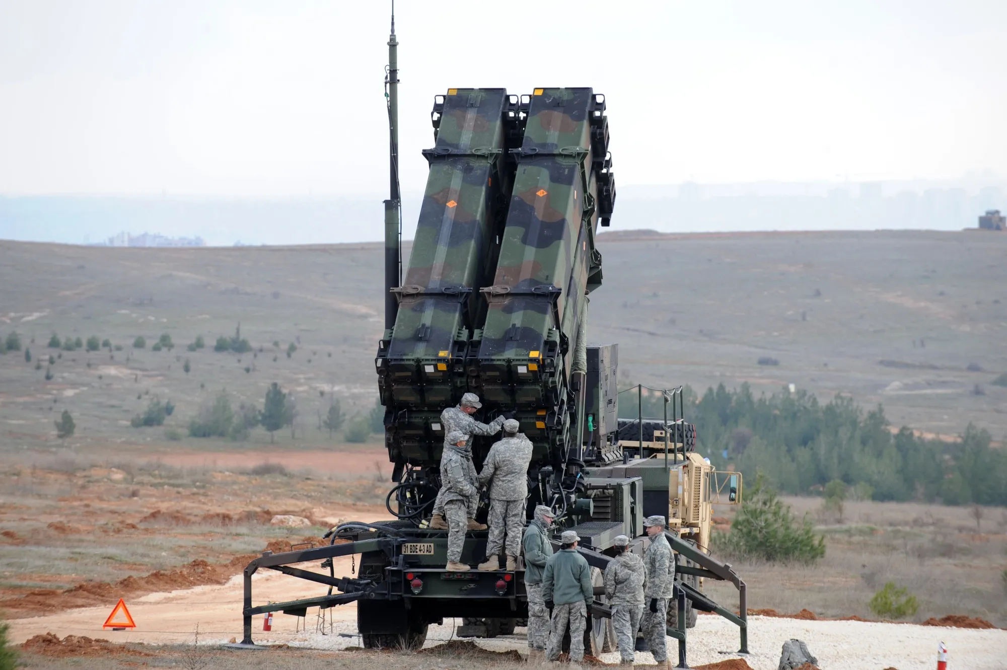 US soldiers work on a Patriot missile system at a military base in Gaziantep, Turkey.