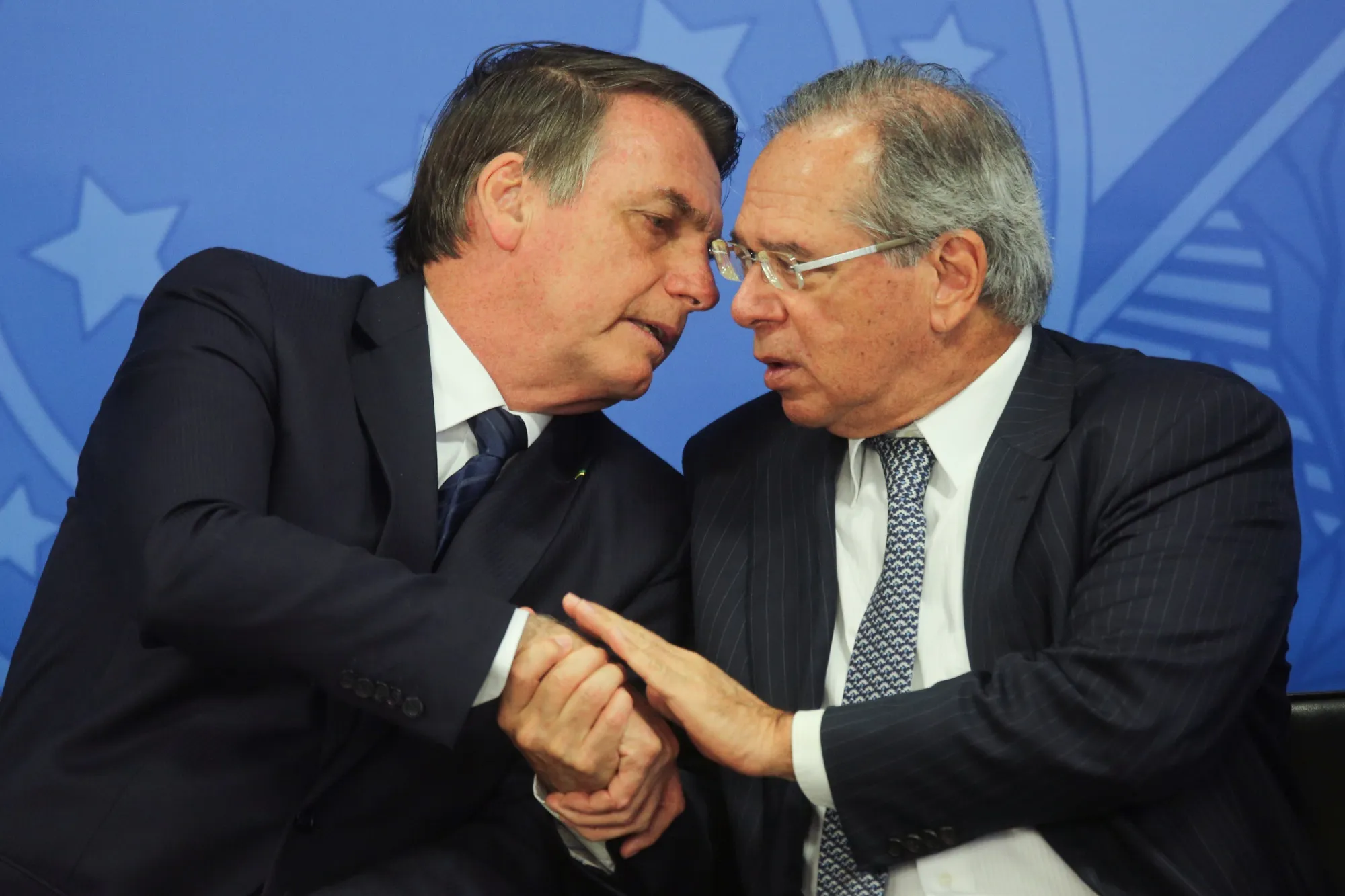 Jair Bolsonaro, Brazil’s president, left, and Paulo Guedes, Brazil’s economy minister