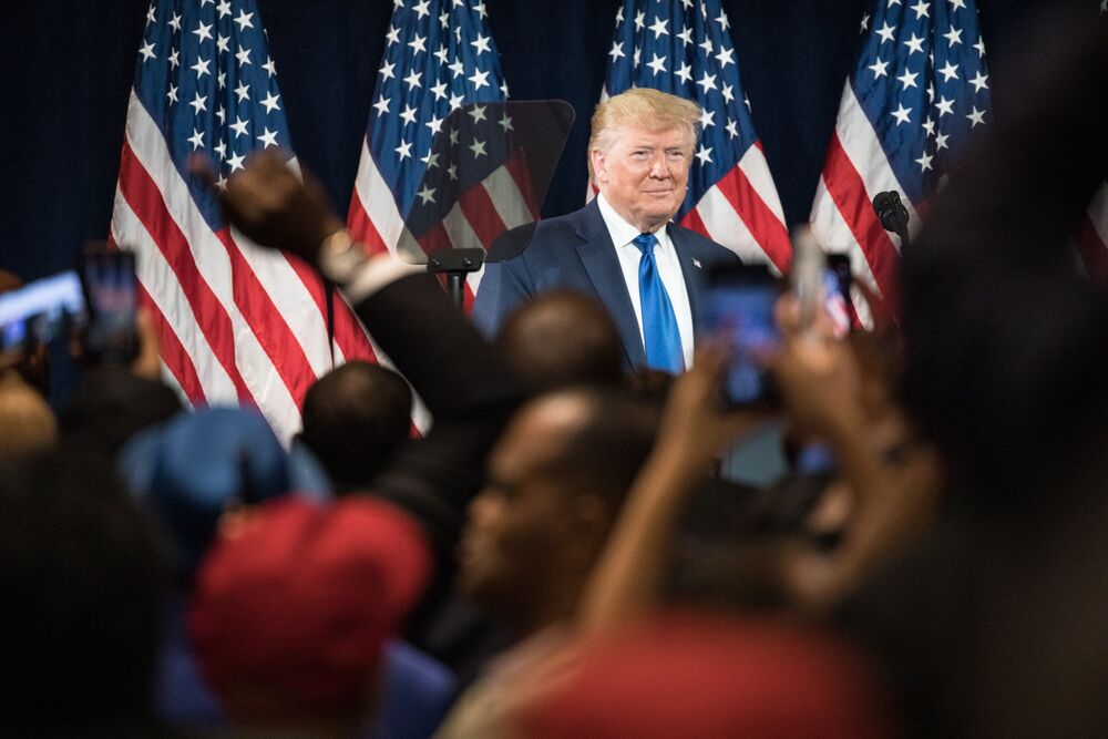 Donald Trump arrives to speak during the 'Black Voices for Trump' launch event in Atlanta, Georgia, on Nov. 8.