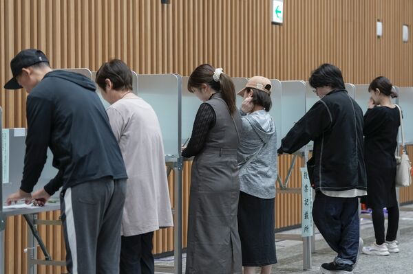 Japanese Voters Cast Ballots In General Election