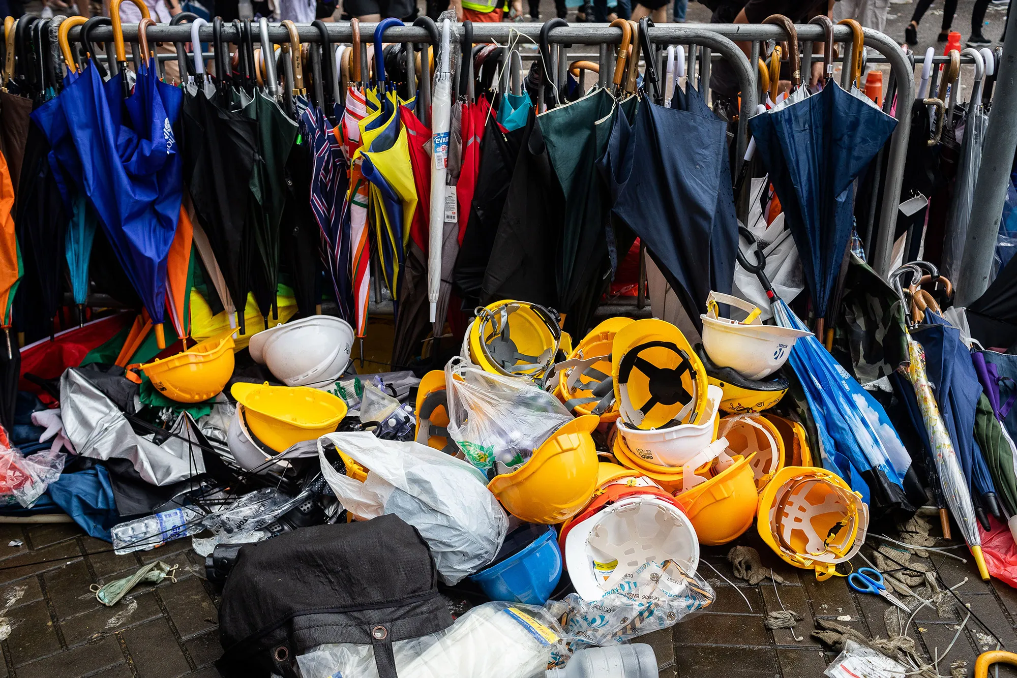 Helmets and umbrellas during a protest in Hong Kong.&nbsp;