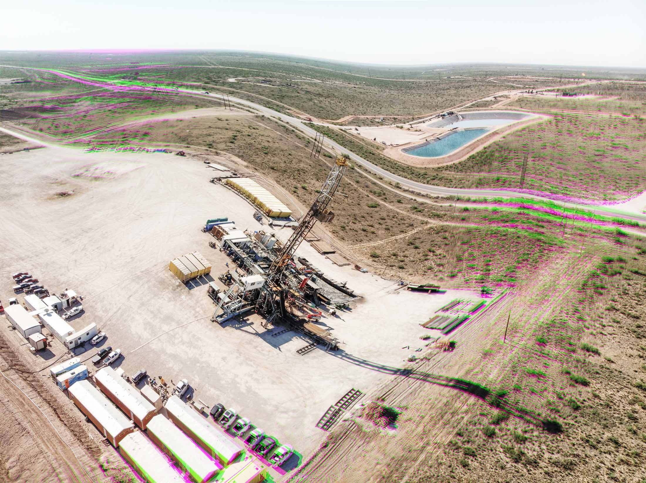 Drone view of an oil and gas drill rig in West Texas, near Pecos.
