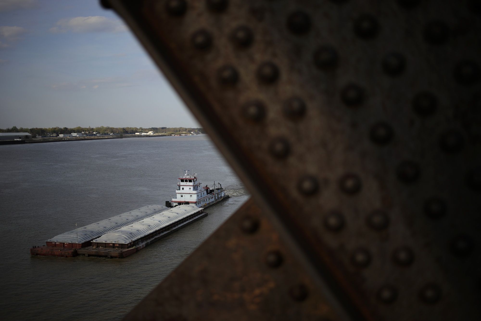 Barges travel along the Ohio River in Louisville, Kentucky, in 2021.&nbsp;