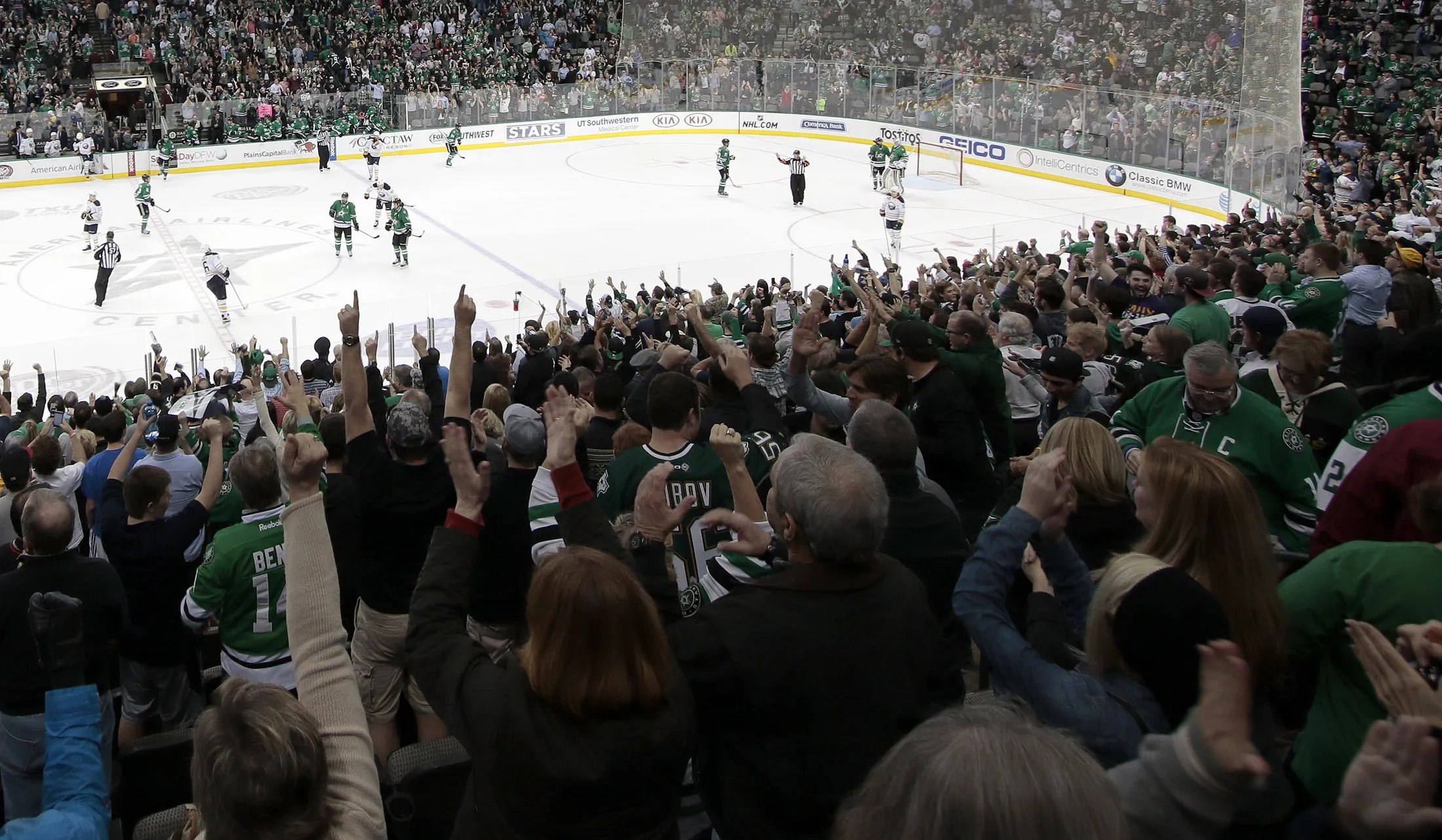 The Dallas Stars fans celebrate a win against the Buffalo Sabres at the American Airlines Center on March 23, 2015 in Dallas, Texas.
