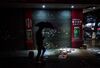 DONGGUAN, CHINA - JANUARY 26: A man walks on a street in front of a closed down convenience store at Houjie town on January 26, 2016 in Dongguan, China. China's slowing economy and falling stock market have caused concerns for investors worldwide and many factories in manufacturing hub such as Dongguan have either closed down or reduced its number of staff. Official data reported its annual growth of 6.9 percent in 2015, the slowest pace in 25 years, and stock markets continue to plunge since the new year. (Photo by Lam Yik Fei/Getty Images)