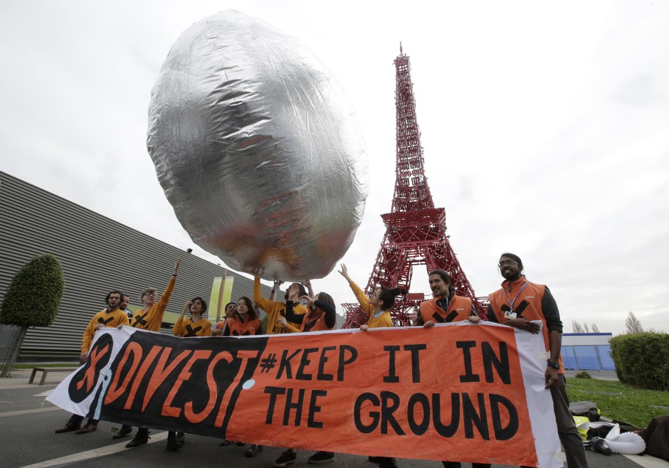 Protesters at the Paris climate change talks in December call for keeping fossil fuels in the ground.