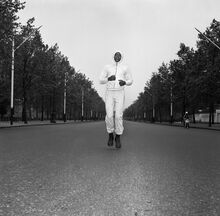 Muhammad Ali running in the Mall, London, before his first fight with Henry Cooper, in 1963.