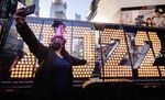 Teresa Hui poses for photos before the 2022 numerals to be used at a new year countdown event in Times Square in New York, on December 20, 2021.