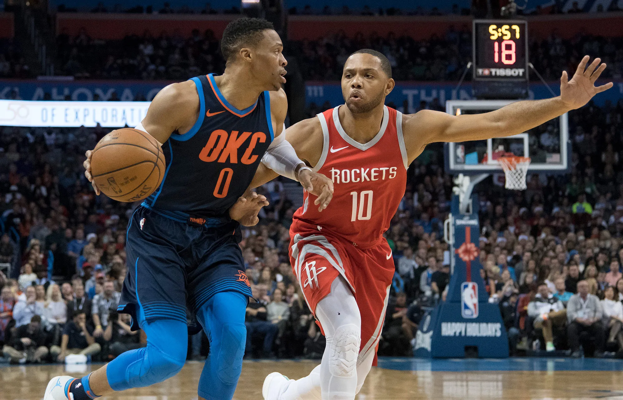 Russell Westbrook #0 of the Oklahoma City Thunder works his way around Eric Gordon #10 of the Houston Rocketsduring the first half of a NBA game at the Chesapeake Energy Arena on Dec. 25, 2017 in Oklahoma City, Oklahoma.&nbsp;