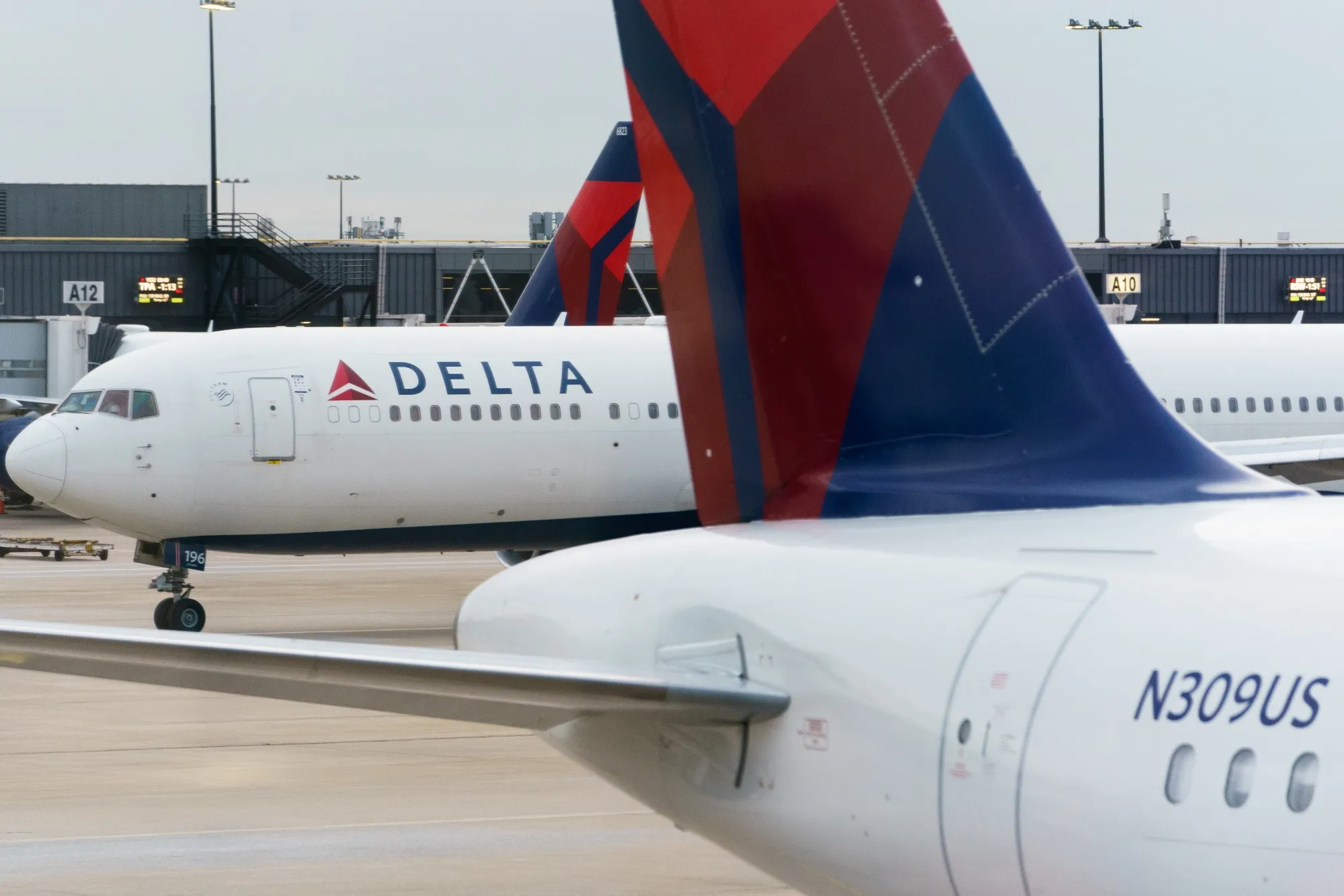 Travelers At Hartsfield–Jackson Atlanta International Airport Ahead Of Christmas Holiday