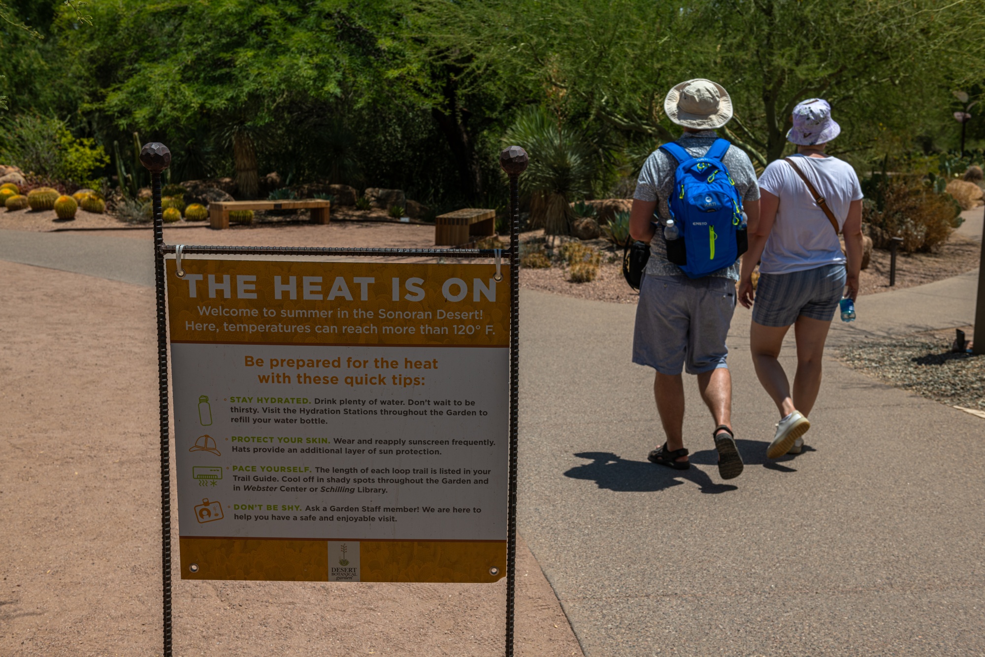 Visitors at the Desert Botanical Garden, which closed early due to high temperatures, during a heatwave in Phoenix, Arizona, US, on Friday, July 14, 2023.