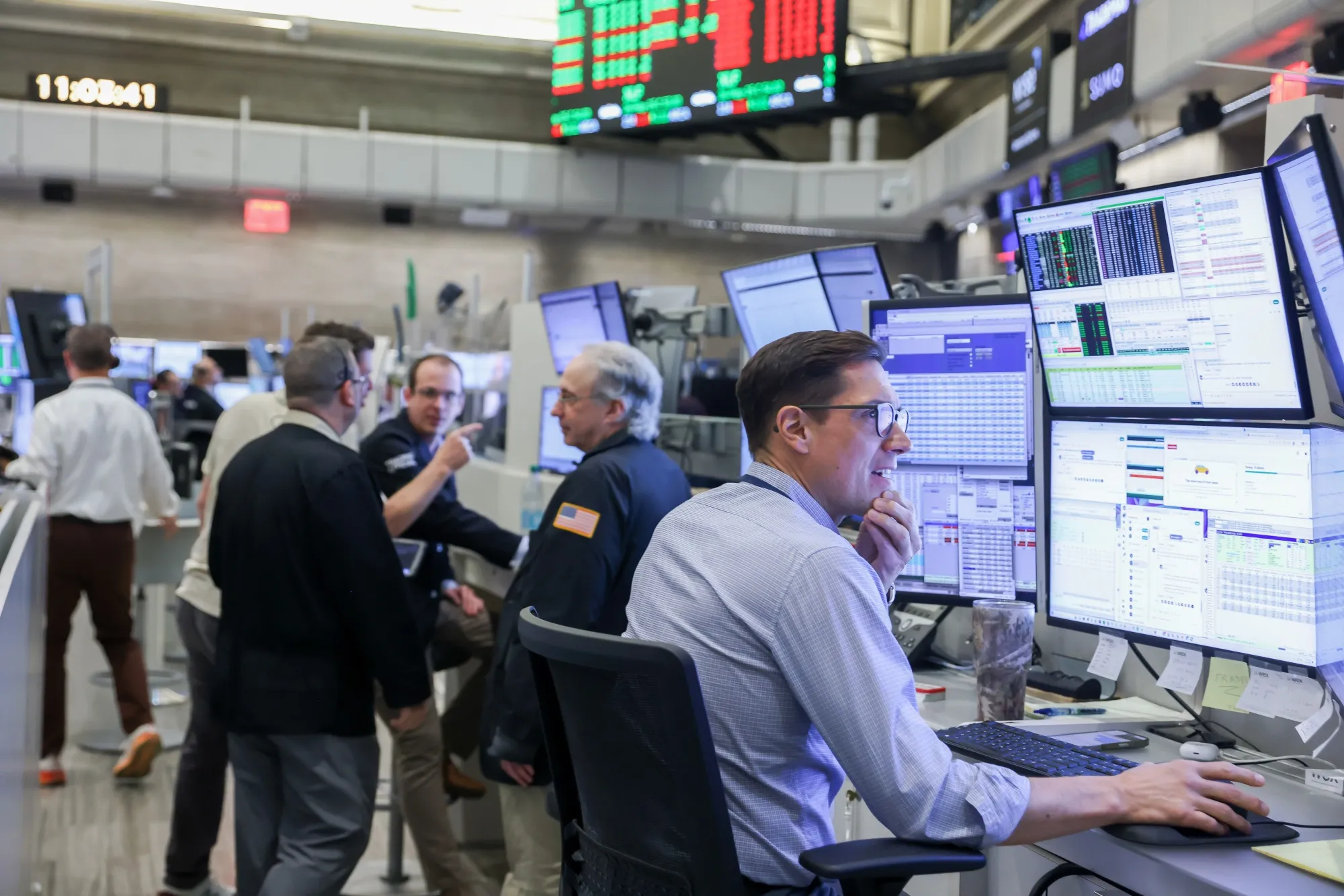 Traders work on the floor of the New York Stock Exchange.