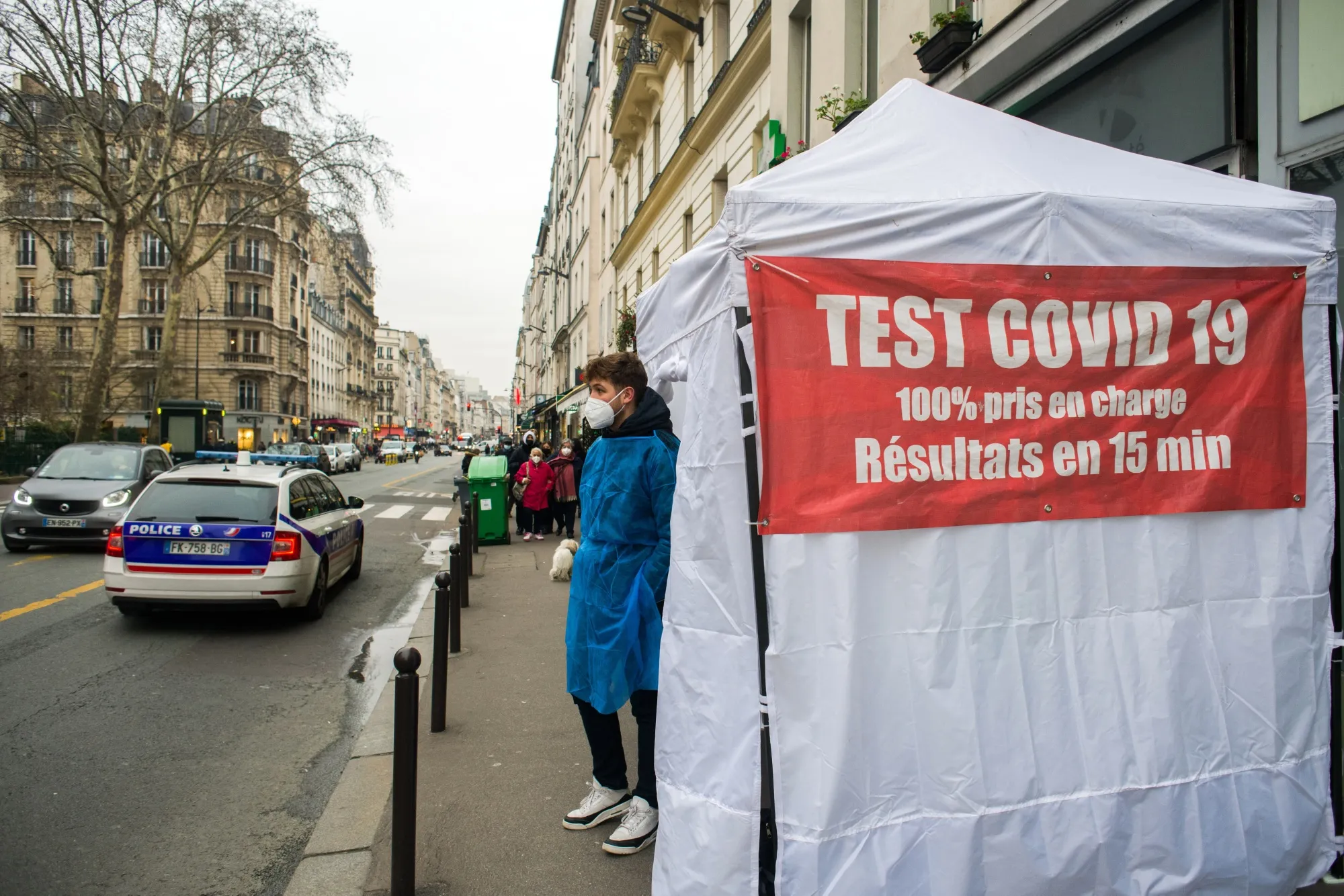 A heath worker waits outside a pop-up Covid-19 testing tent in Paris&nbsp;on&nbsp;Jan. 12.&nbsp;