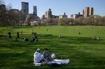 People enjoy the warm weather at&nbsp;Central Park in New York.