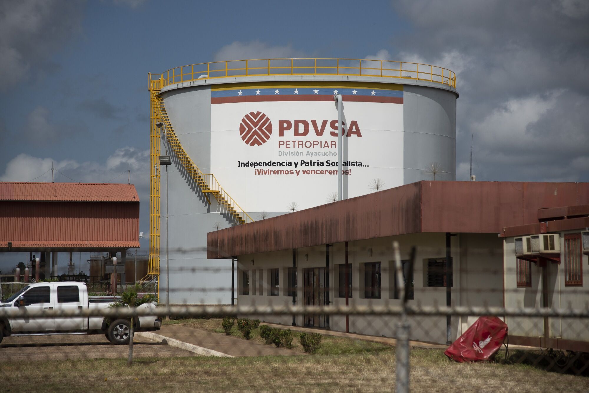 An oil tank stands at the Petropiar facility in El Tigre, Venezuela.