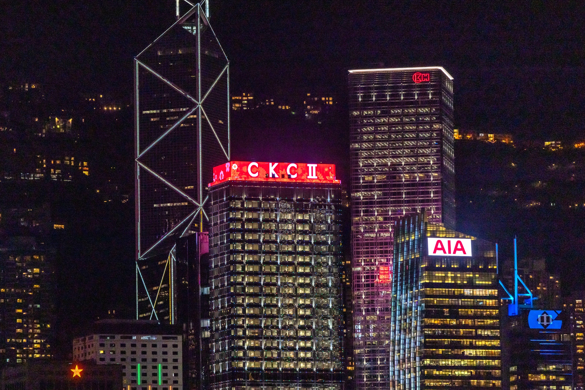 The Cheung Kong Center II, center left, and the Cheung Kong Center, in Hong Kong in March. 