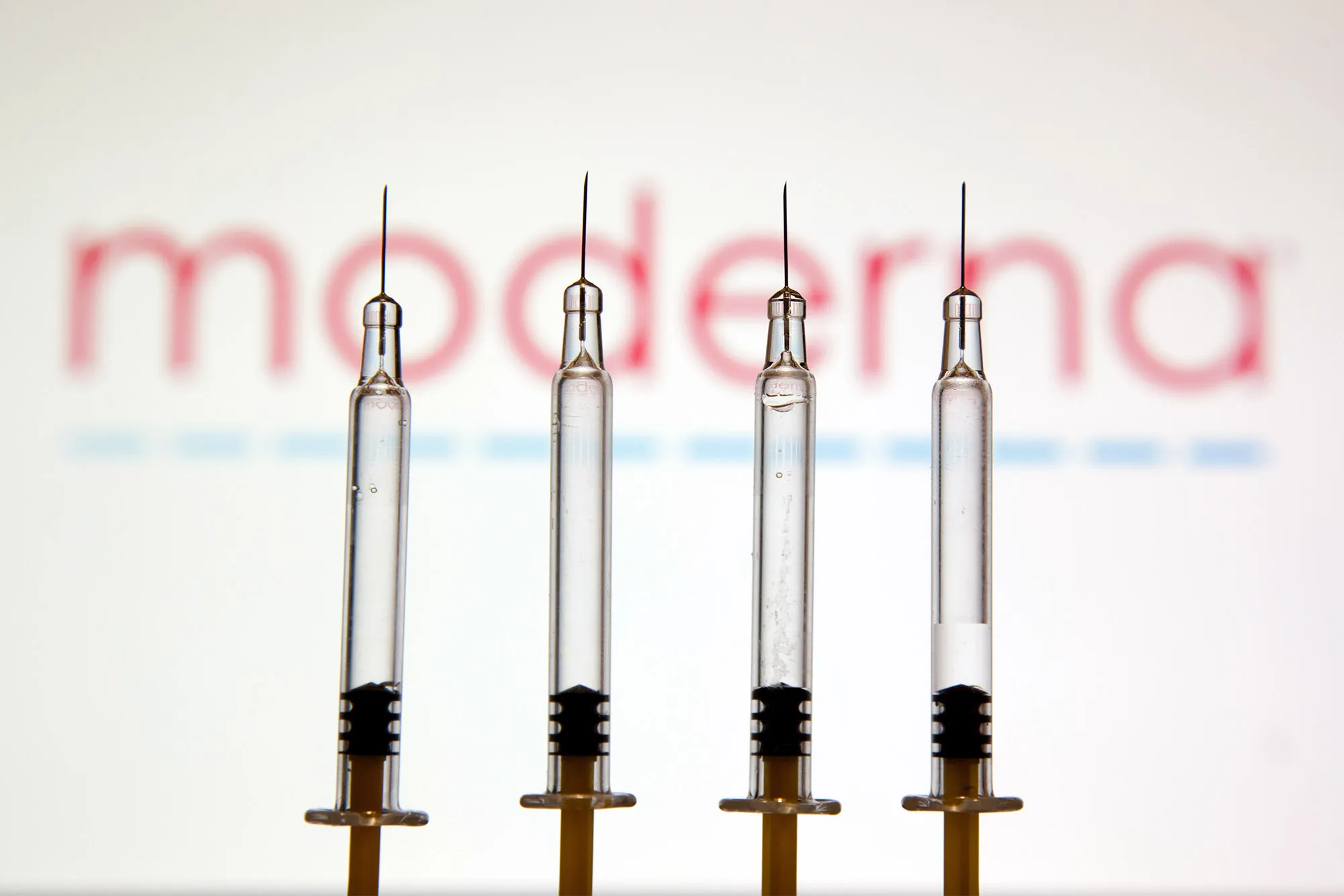 In this photo illustration, medical syringes seen displayed