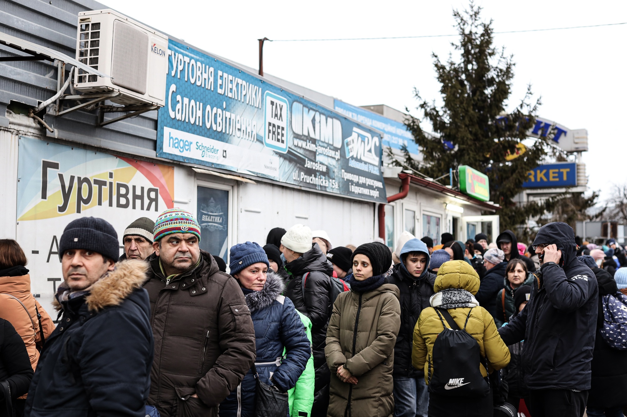 A line of displaced Ukrainians at the Polish&nbsp;border.
