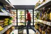 An employee fills electronic orders in a special storage room for the one-hour delivery platform at a Wal-Mart store in Shanghai.