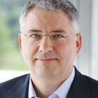 Headshot of Dr Severin Schwan